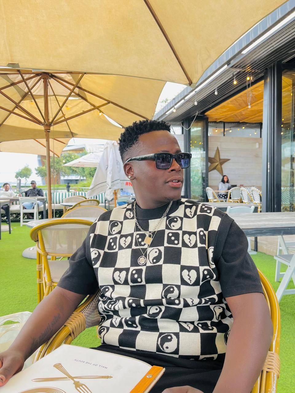 Young fashion designer in studio